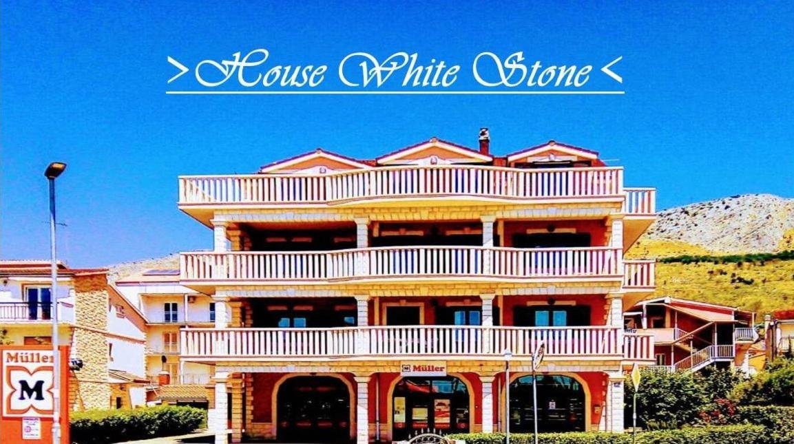 House White Stone Split Apartment